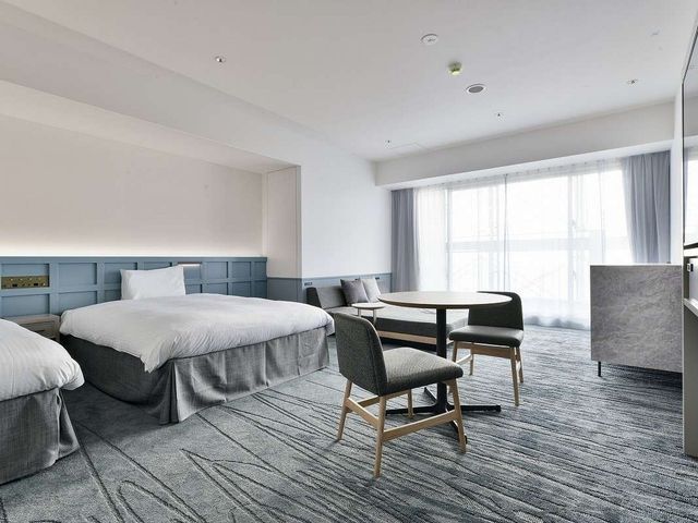 ホテルの<br />
大部屋に泊まるイメージ